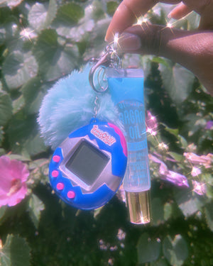 
            
                Load image into Gallery viewer, Co 90’s Babe Tamagotchi Lipgloss Key Chain BUNDLE✨✨ Glo Babe 
            
        