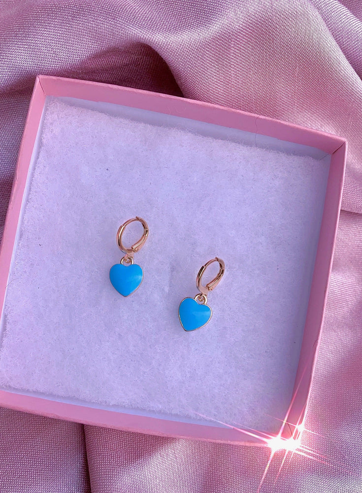 
            
                Load image into Gallery viewer, Candy Babe Heart 💜💗 Huggie Earrings ✨🍭🍬 Glo Babe Blue 
            
        